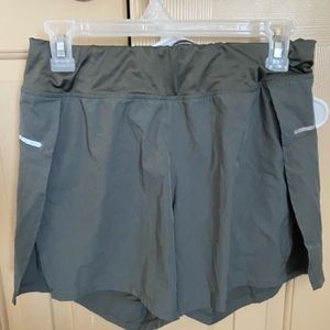 Green athletic shorts